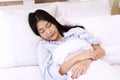 Beauty woman sleeping on white bed at home. Top view relax young girl lying on pillow. Healthy life concept