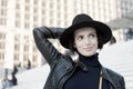 Beauty, look, makeup. Woman in black hat smile on stairs in paris, france, fashion. Fashion, accessory, style. Sensual Royalty Free Stock Photo