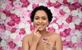 african american woman applying lip gloss Royalty Free Stock Photo