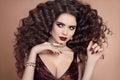 Beauty makeup. Curly hair. Glamour fashionable portrait of beaut