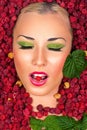 Beauty Makeup face in raspberries