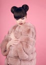 Beauty makeup. Fashion teen girl model in fur coat. Brunette wit