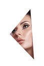 Beauty makeup women, eye brows eyelashes and lips in a triangular hole paper white background. Professional beauty makeup, place