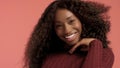 Beauty black mixed race african american woman with long curly hair and perfect smile