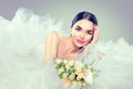 Beauty model bride in wedding dress with long train Royalty Free Stock Photo