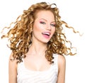 Beauty model girl with blonde curly hair