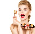 Beauty model girl eating sushi rolls