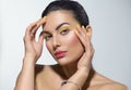 Beauty model girl with fashion make-up, Bright yellow eye line and nails, trendy manicure. Eye make-up creative ideas Royalty Free Stock Photo