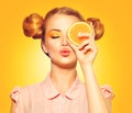 Beauty model girl takes juicy oranges Royalty Free Stock Photo