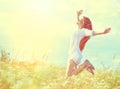 Beauty model girl in white dress jumping Royalty Free Stock Photo