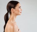 Beauty Model Perfect Face Profile. Brunette Woman with Healthy Smooth Facial Skin and Hair over White. Beautiful Girl Side view Royalty Free Stock Photo