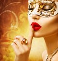Beauty model woman wearing venetian mask Royalty Free Stock Photo