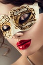 Beauty model woman wearing venetian mask Royalty Free Stock Photo