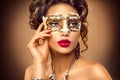 Beauty model woman wearing venetian mask Royalty Free Stock Photo