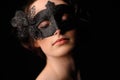 Sexy model woman in venetian masquerade carnival mask. Christmas and New Year celebration. Glamour lady Royalty Free Stock Photo