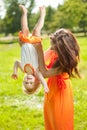 Beauty Mom and baby outdoors. Happy family playing in nature. Mo Royalty Free Stock Photo