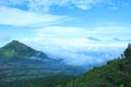 the beauty of Mount Andong with a stretch of white clouds above Royalty Free Stock Photo