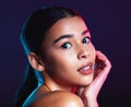 Beauty, neon shadow light and portrait of woman with dark lighting, facial cosmetics and skincare glow. Luxury studio