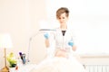 Beauty parlor. doctor cosmetologist performs preparation for work