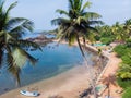 Beauty Pathem beach on the background of palm trees. Aerial view landscape. Goa state in India. Royalty Free Stock Photo