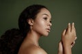 Beauty photo of young elegant African American woman with afro. Hands poses. Gentle portrait.  Fashion beauty close up portrait. N Royalty Free Stock Photo