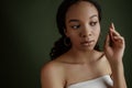 Beauty photo of young elegant African American woman with afro. Hands poses. Gentle portrait. Fashion beauty close up portrait. N