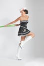 Beauty pinup girl in a sailor suit rope pulling Royalty Free Stock Photo