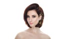 Beauty portrait of adult adorable fresh looking brunette woman with gorgeous makeup diy headpiece bob hairdo posing against isolat Royalty Free Stock Photo