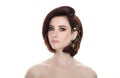 Beauty portrait of adult adorable fresh looking brunette woman with gorgeous makeup diy headpiece bob hairdo posing against isolat Royalty Free Stock Photo