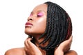 Beauty portrait of an african american girl closed eyes. pink visage make-up. white background. isolate Royalty Free Stock Photo