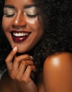 Beauty portrait of african american woman with afro hairstyle and glamour makeup. Royalty Free Stock Photo