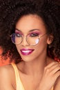 Beauty portrait of afro girl in fashionable eyeglasses Royalty Free Stock Photo