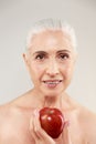 Beauty portrait of an attractive half naked elderly woman Royalty Free Stock Photo