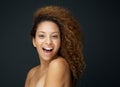 Beauty portrait of an attractive woman laughing with curly hair Royalty Free Stock Photo