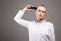 Beauty portrait of bald Girl with hairclipper Royalty Free Stock Photo