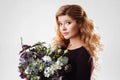 Beauty portrait. Beautiful blonde woman with flowers. Royalty Free Stock Photo