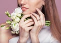 Beauty Portrait. Beautiful Spa Woman Touching her Face. Royalty Free Stock Photo