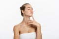 Beauty Portrait. Beautiful Spa Woman Touching her Face. Perfect Fresh Skin. Pure Beauty Model Girl. Youth and Skin Care Royalty Free Stock Photo