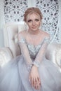 Beauty portrait of bride wearing fashion wedding dress. Elegant
