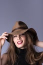 Beauty portrait of a girl-cowboy. Beautiful young lady smiling happily Royalty Free Stock Photo