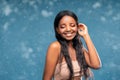 Beauty portrait of happy, adorable african american young woman with glamour makeup