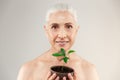 Beauty portrait of a joyful half naked elderly woman Royalty Free Stock Photo