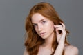 Beauty portrait of a pretty redhead woman Royalty Free Stock Photo