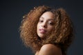 Beauty portrait of a pretty young woman with curly hair Royalty Free Stock Photo