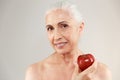 Beauty portrait of a smiling half naked elderly woman Royalty Free Stock Photo
