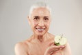 Beauty portrait of a smiling half naked elderly woman Royalty Free Stock Photo