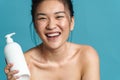 Beauty portrait of a smiling topless young asian woman Royalty Free Stock Photo
