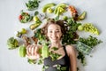 Portrait of a sports woman with healthy food