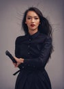 Beauty portrait, sword and samurai woman art in ninja or warrior fashion to fight for power and fantasy. Asian female Royalty Free Stock Photo