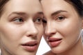 Beauty portrait of two women with natural make up. Natural gloss of skin and perfect eyebrows and long lashes.